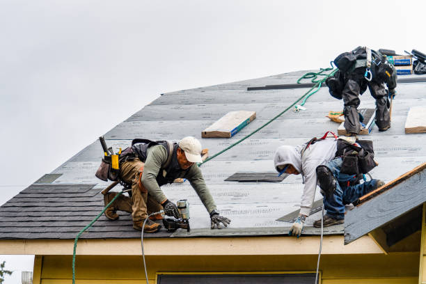 Professional Roofing technician working in Greene, ME